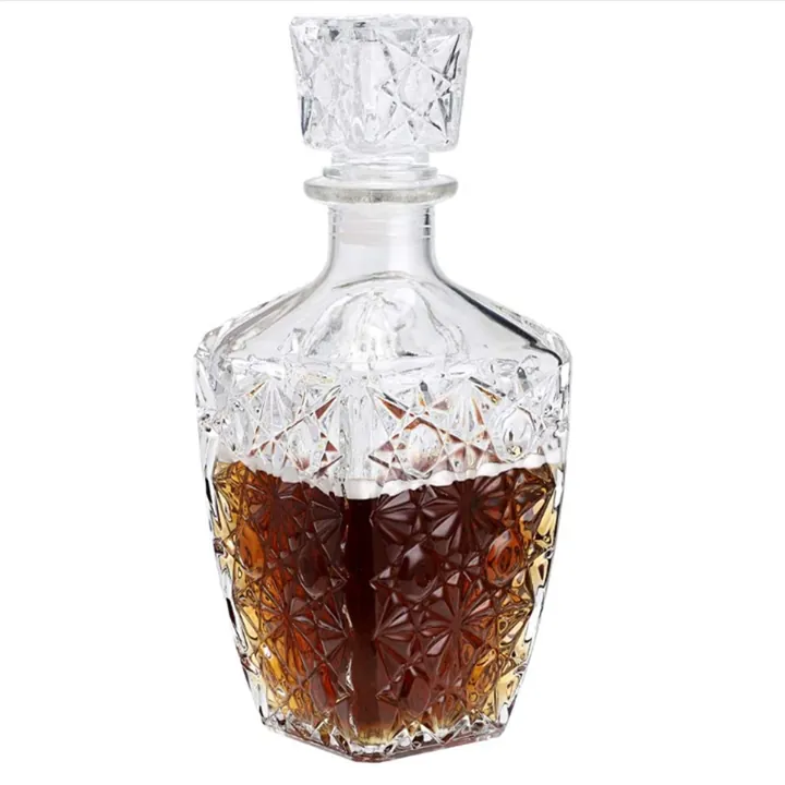 Botella de licor de cristal facetado con tapón de cristal tallado