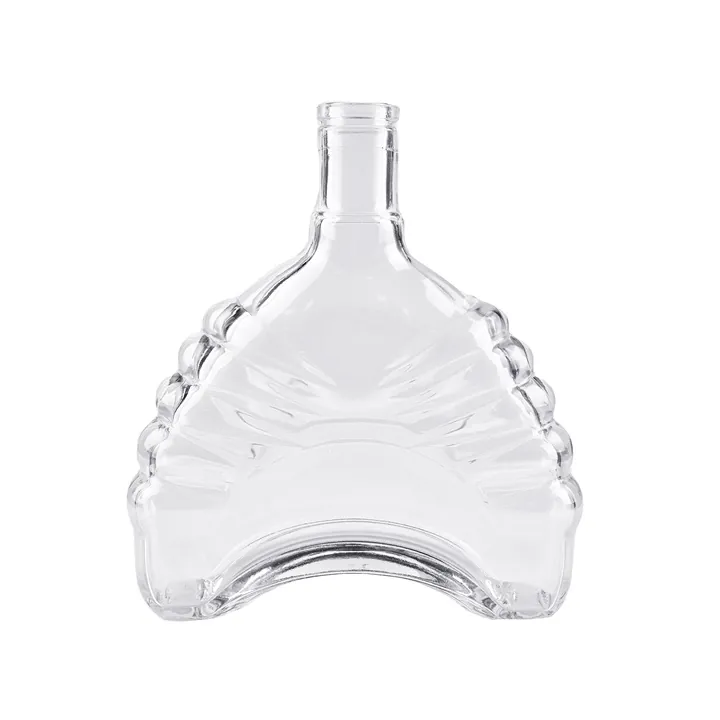 Transparent fan shaped liquor bottle with raised pattern and dot texture