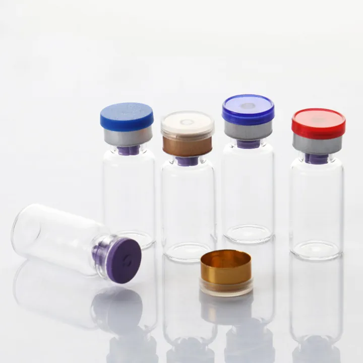 Clear pharmaceutical vials with colored aluminum caps
