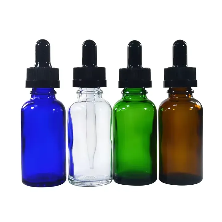 Blue clear green and amber glass dropper bottles