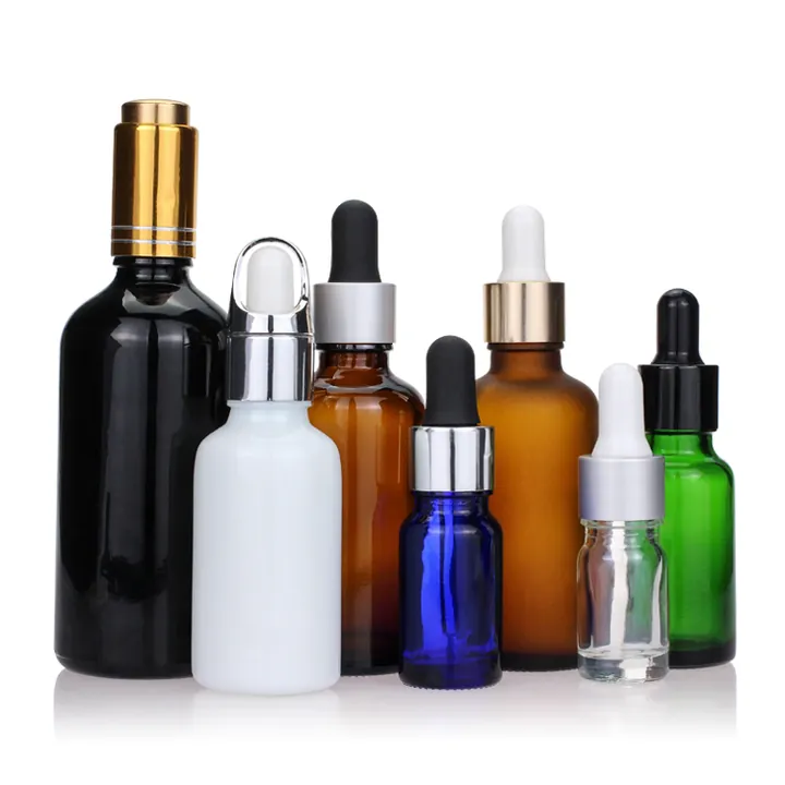 Assorted essential oil bottles with different colors and droppers