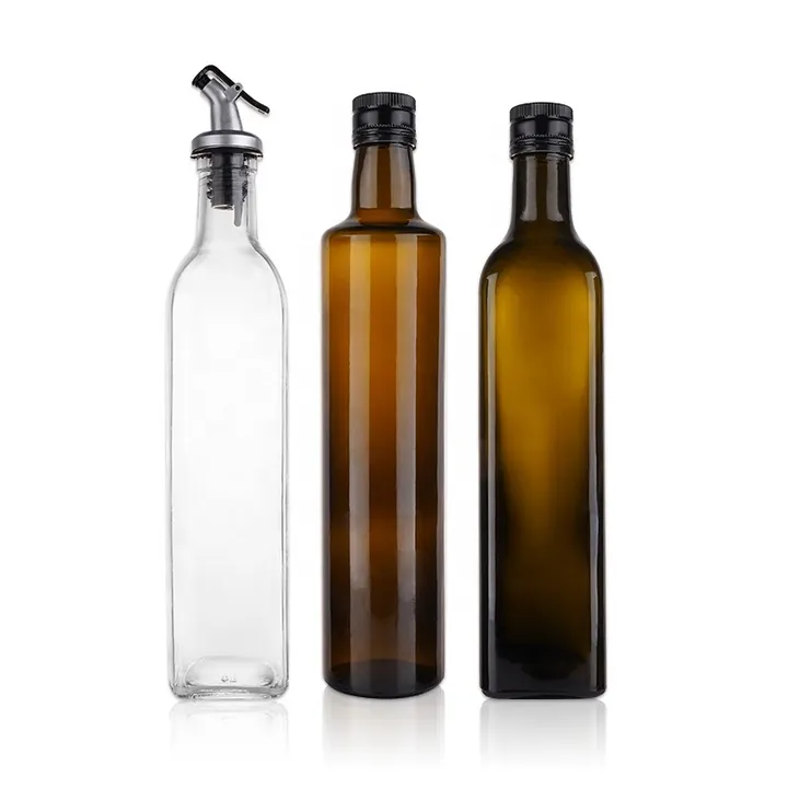 Olive oil bottles including metal pourer accessory