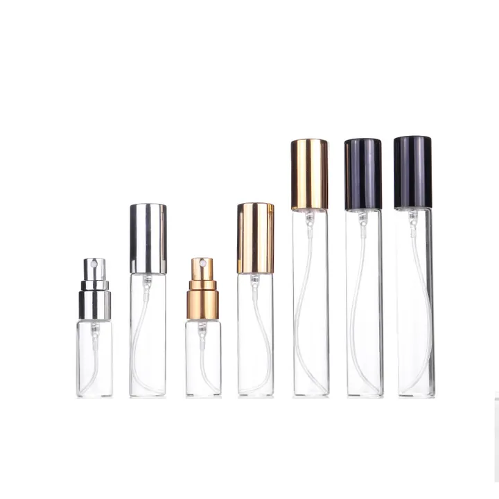 Transparent spray bottles with different colored caps