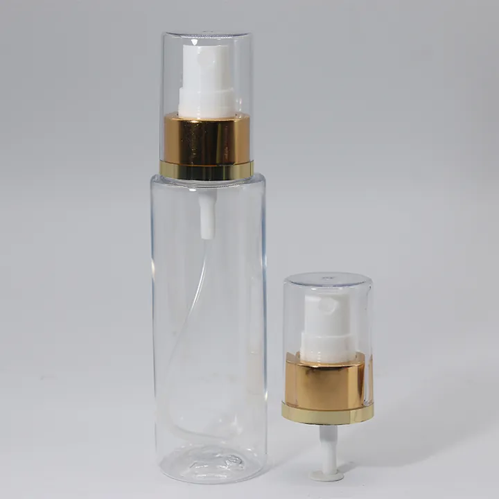 Clear atomizer bottle with gold spray pump head
