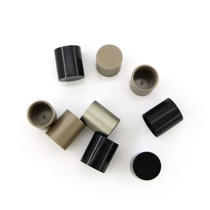 Cylinder perfume bottle caps in black champagne and silver colors
