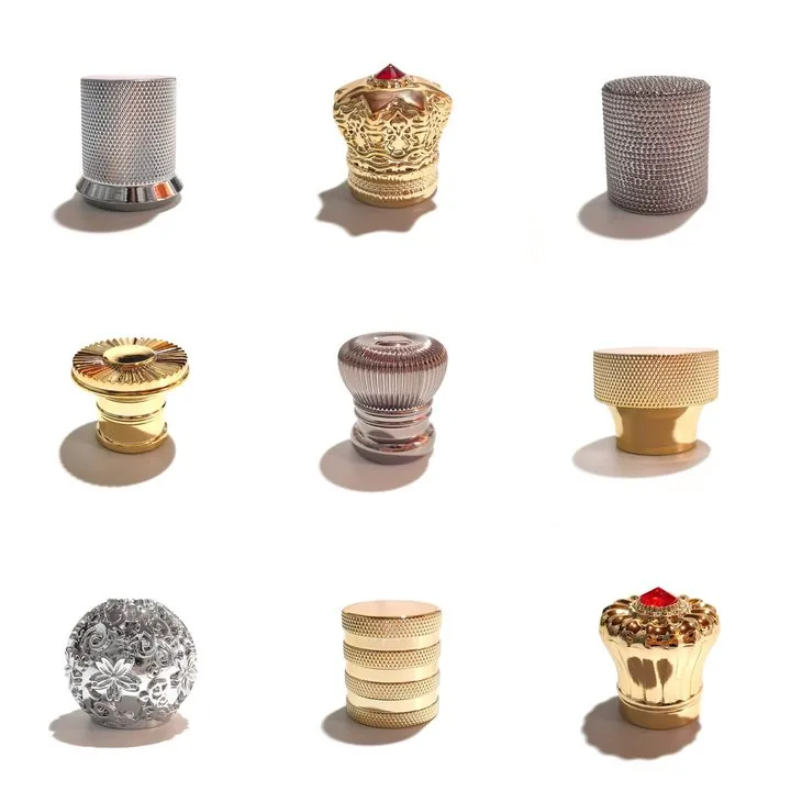 Nine perfume bottle caps in different shapes displayed together