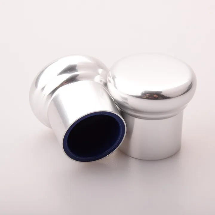 Silver round perfume bottle cap with metallic surface