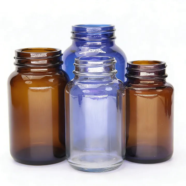 Amber, blue and clear wide-mouth pharma bottles for tablet and capsule packaging