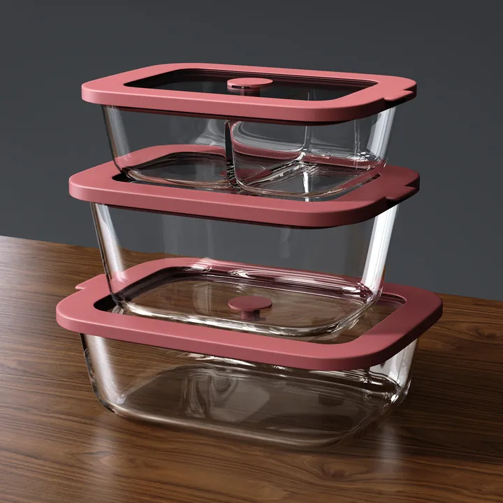 Three pink lid glass food containers stacked together