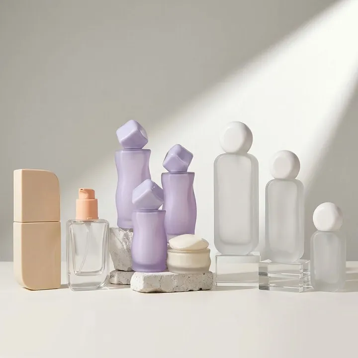 Assorted shaped frosted portable perfume bottles with varied caps