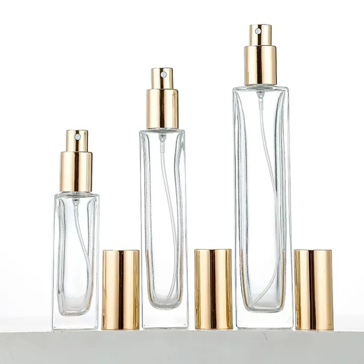 Square transparent portable perfume bottles with gold spray heads