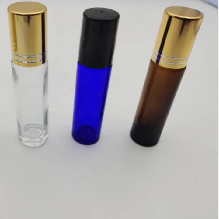 Clear blue and amber glass roll on bottles