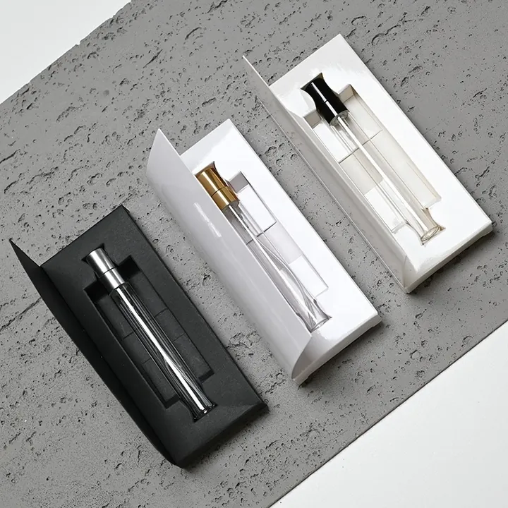 Three perfume sample vials displayed in gift box packaging
