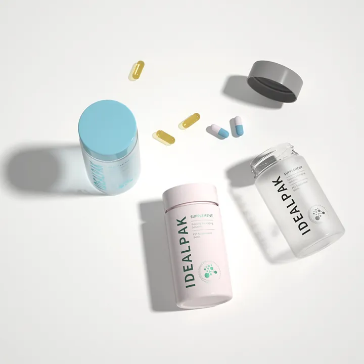 Pastel colored supplement bottles with capsule display