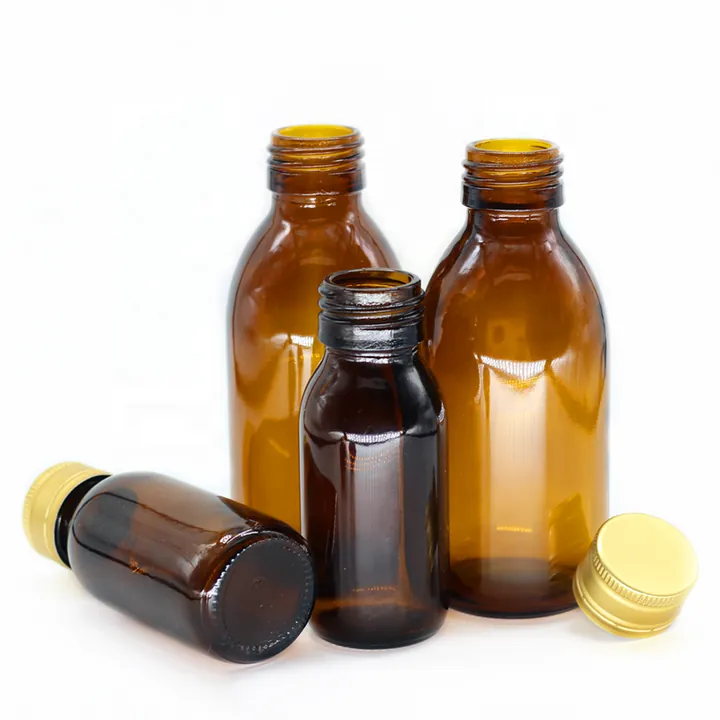 Amber glass syrup bottles with gold aluminum caps