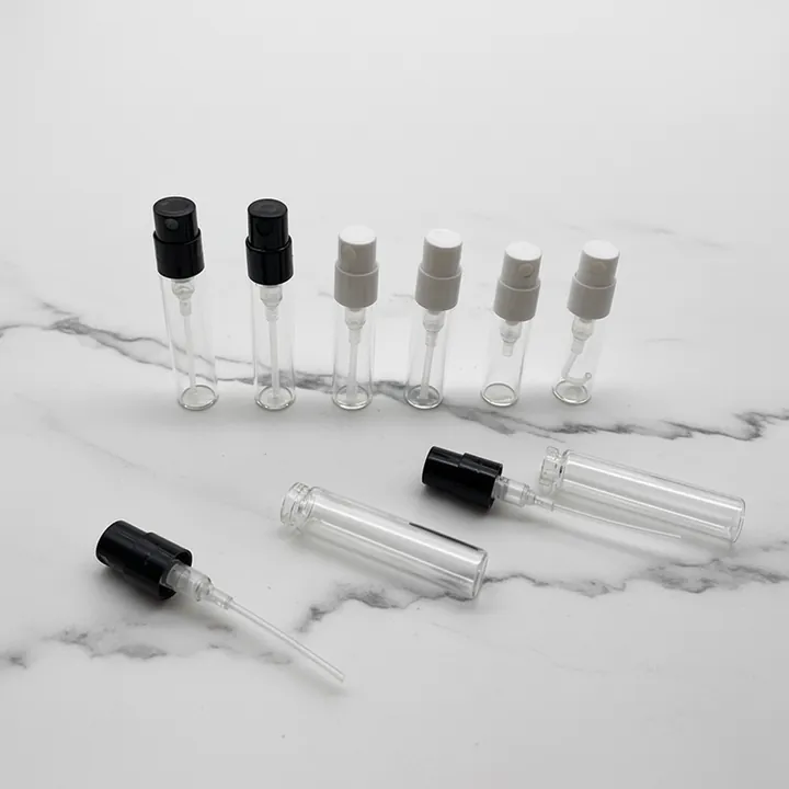 Clear round perfume tester spray bottles with black white and gray sprayers