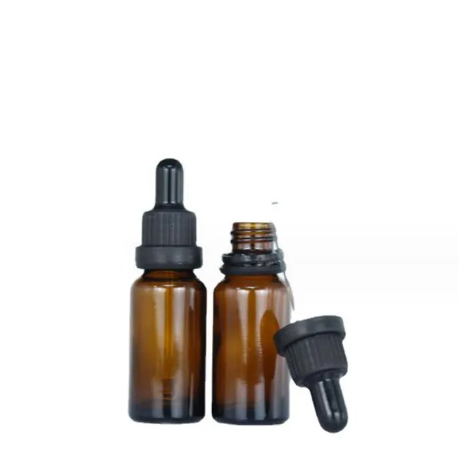 Small amber glass dropper bottles displayed together