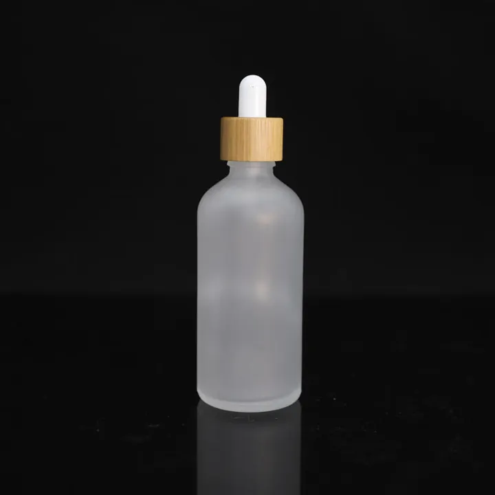 Frosted glass tincture bottle with bamboo dropper cap