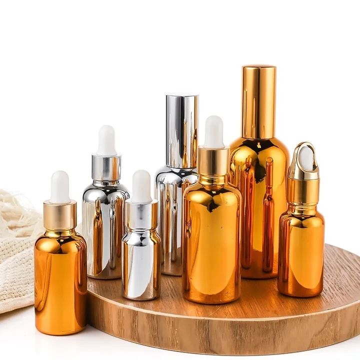 Glass tincture bottles with metallic dropper caps