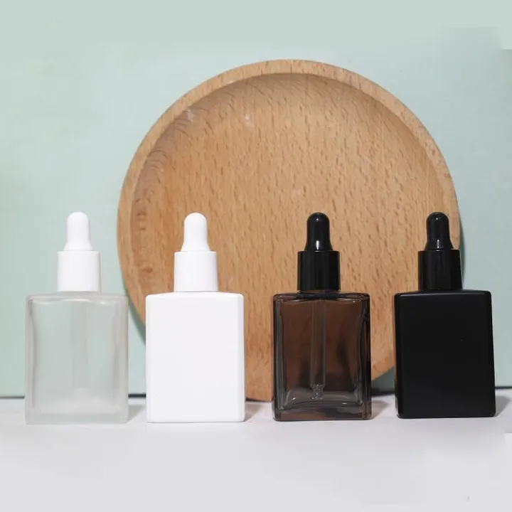 Square glass dropper bottles in multiple colors