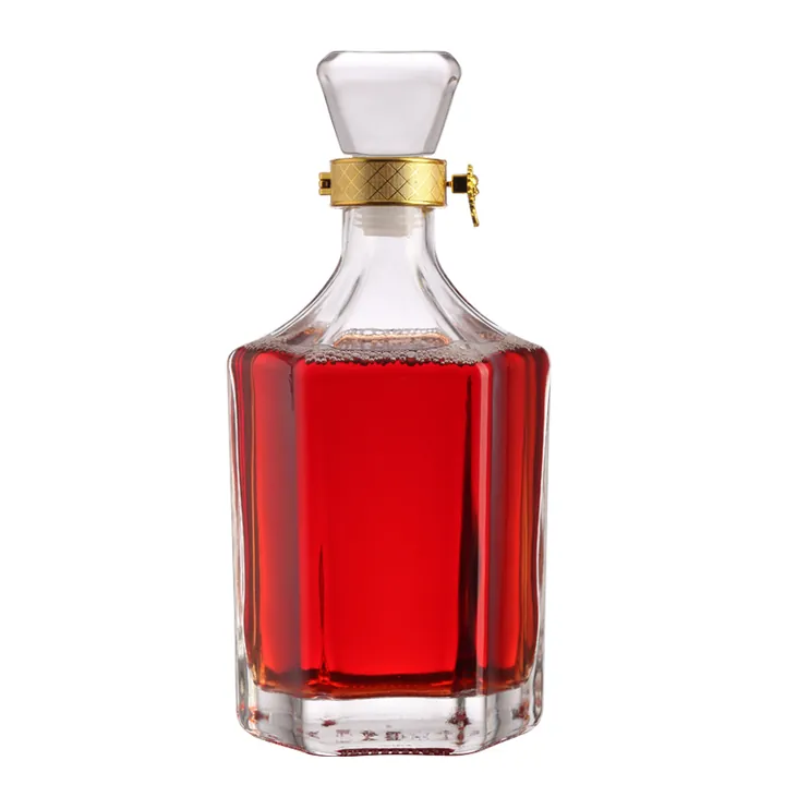 Whiskey bottle with gold collar decoration and polygon glass stopper