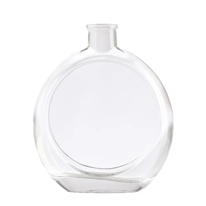 Botella de whisky redonda, plana y transparente
