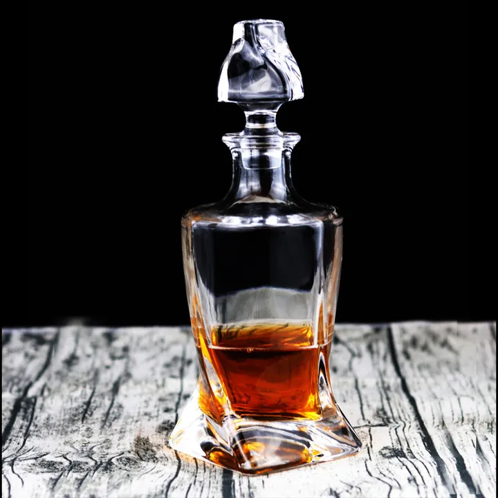 Decantador de whisky transparente trenzado con tapón de cristal