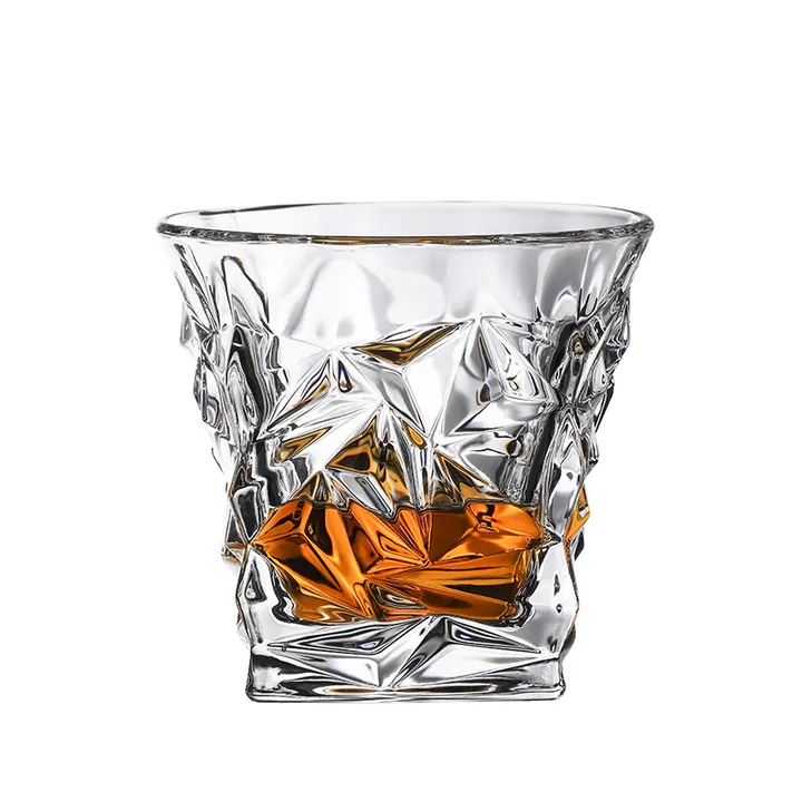 Irregular faceted thick bottom whiskey glass