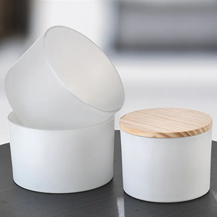 White frosted glass candle jars with light wooden lid