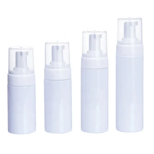 Multiple white foam pump bottles in different heights